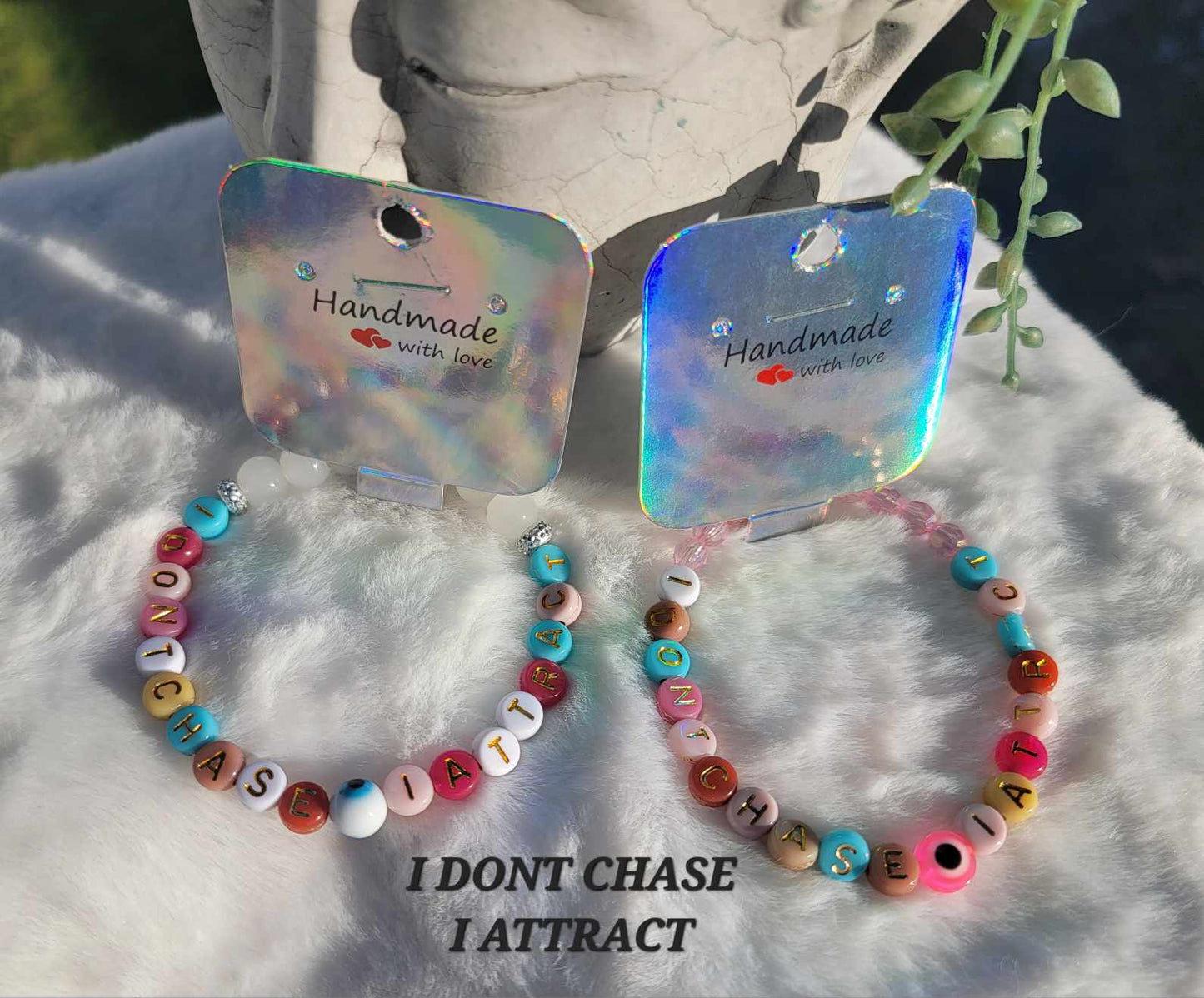 Pink Hue's Affirmation "I Don't Chase I Attract" Evil Eye Collection